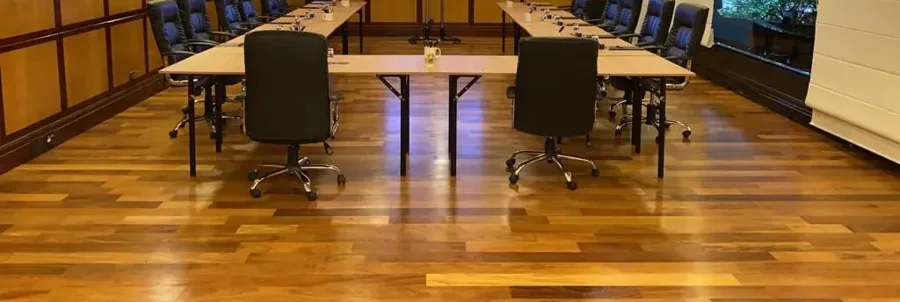 Boardroom furnished with a meeting table and executive chairs